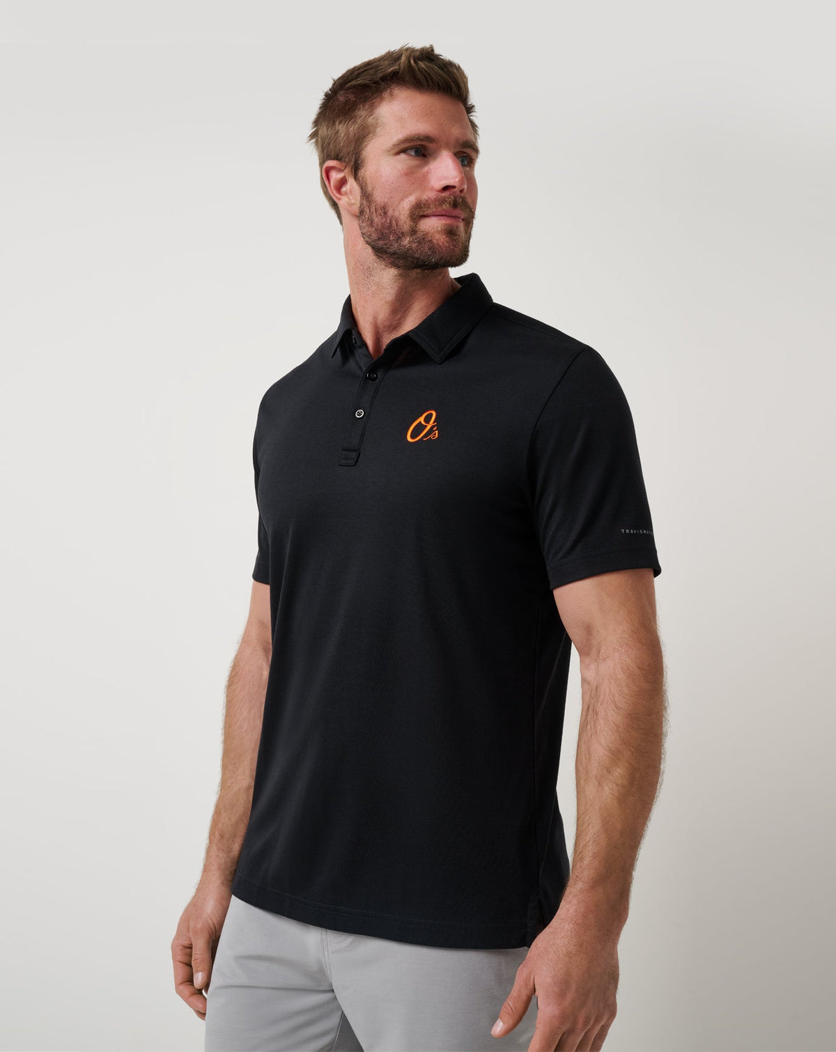 TravisMathew | Baltimore Orioles Playoff Pitch Polo - Black
