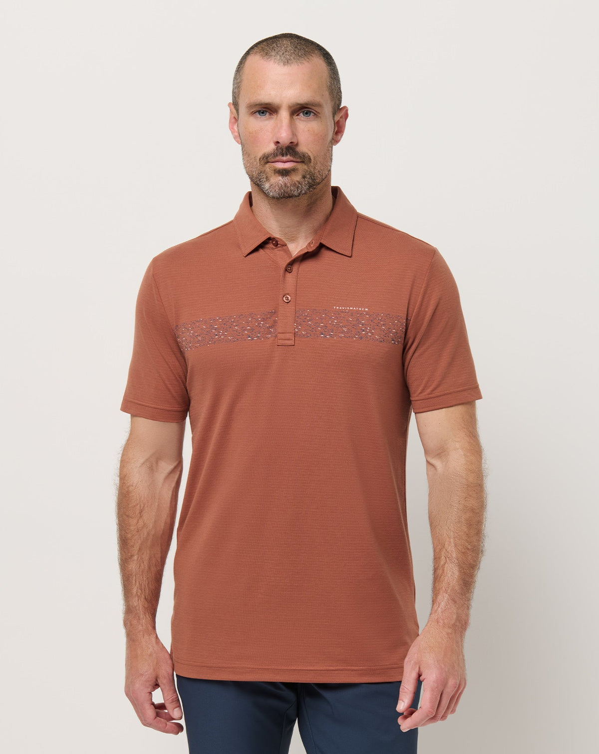 TravisMathew | The Heater Chest Stripe Polo - Maple