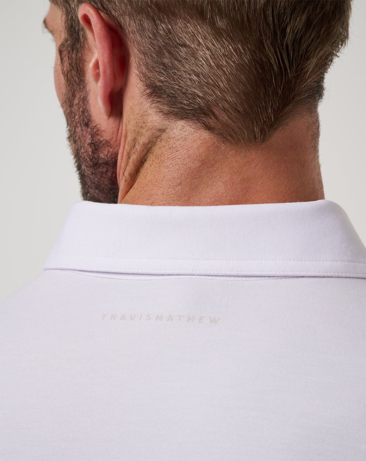 TravisMathew | Featherweight On The Grind Polo - White