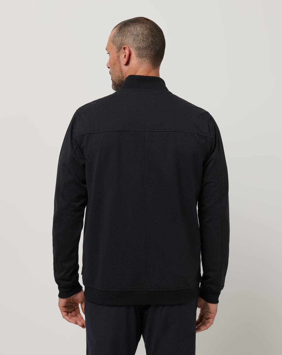 TravisMathew | Stretchknit Bomber Jacket - Black