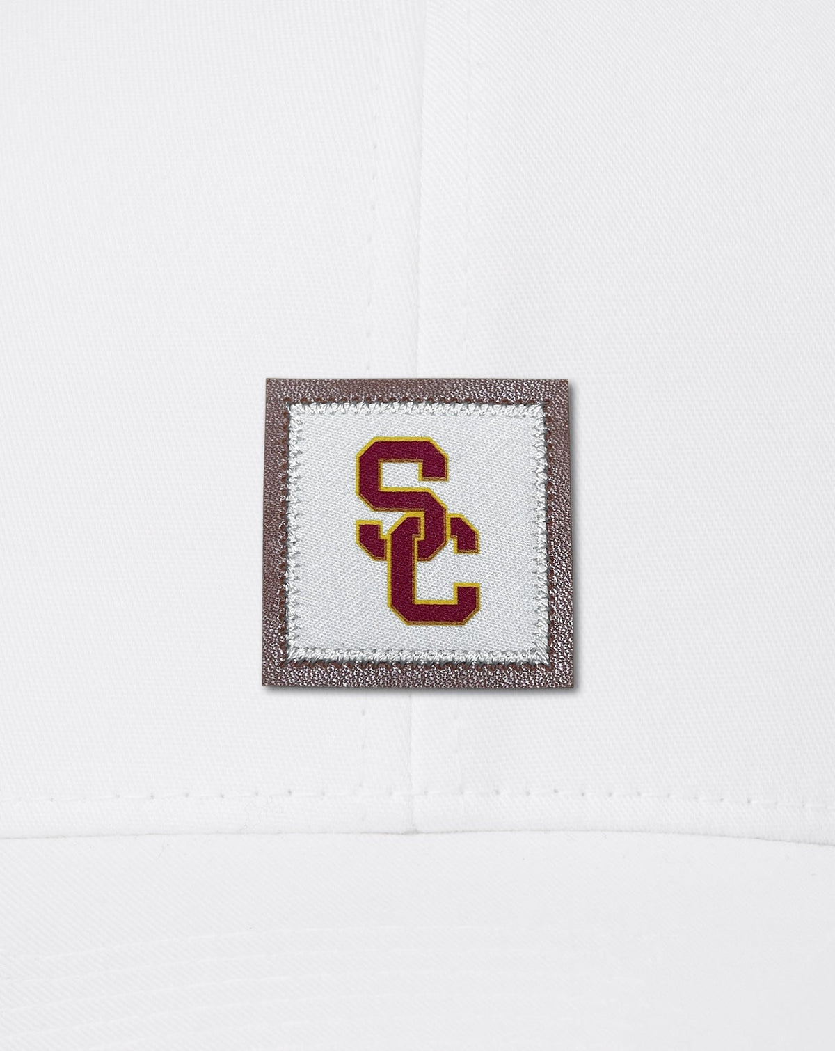 TravisMathew | USC Leather Patch Snapback Hat - White