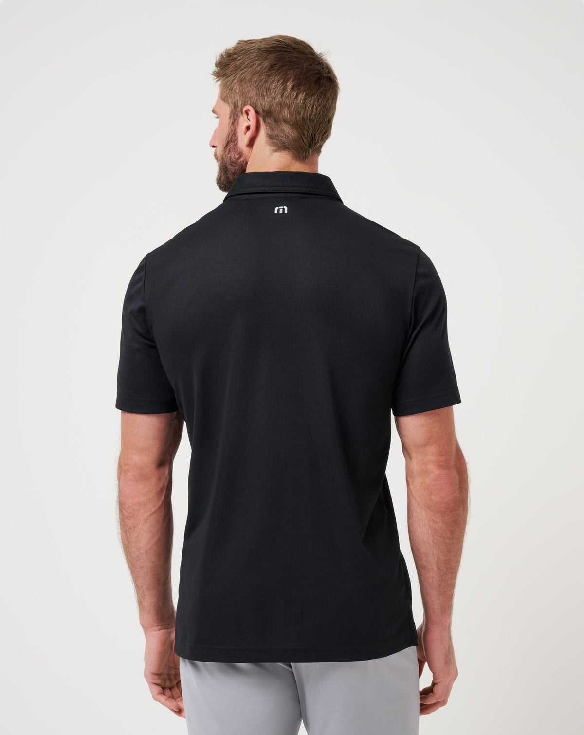 TravisMathew | Iowa School Pride Polo - Black