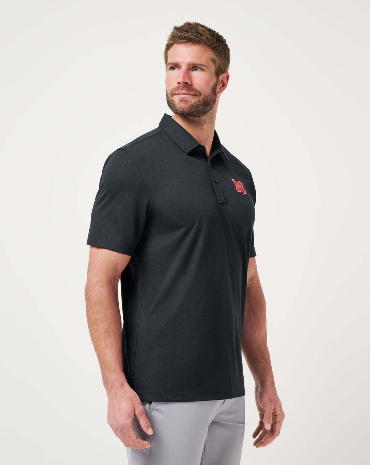 TravisMathew | Nebraska School Pride Polo - Black