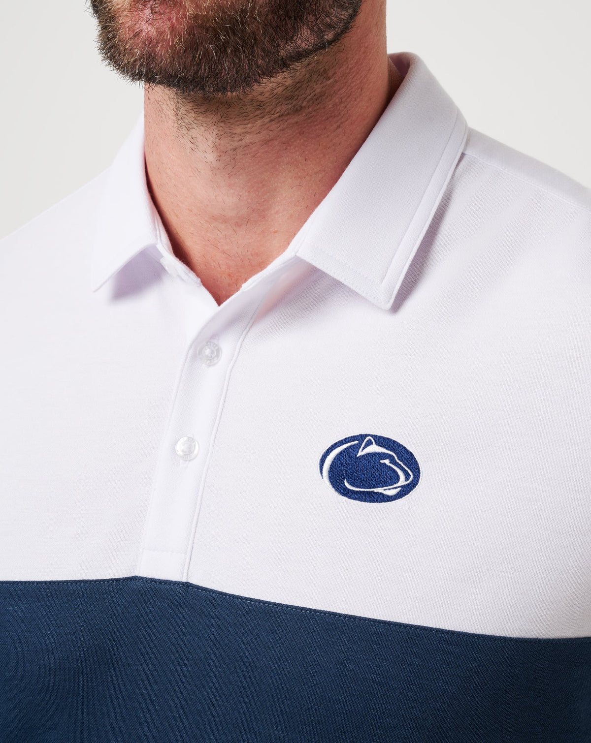 TravisMathew | PSU Drop Back Polo - White/Navy